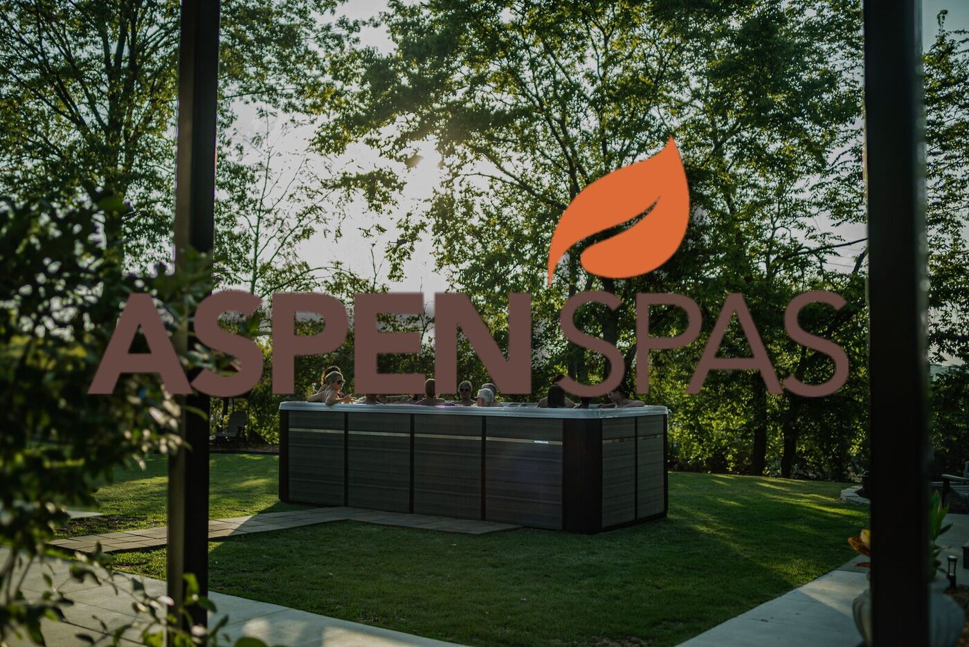 An Aspen swim spa in a backyard